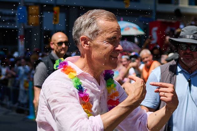 June 28, 2026, Toronto, On, Canada: Prime Minister Mark Carney is sprayed with water as he takes part in the Toronto Pride Parade on Sunday, June 28, 2026. Toronto Canada  - ZUMAc35_ 20260628_zaf_c35_038 Copyright: xSammyxKoganx