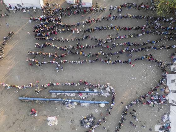 Malawian migrants wait to return home amid anti-foreigner protests in South Africa DURBAN, SOUTH AFRICA - JUNE 28: An aerial view of the area as Malawian migrants wait to be registered by South African immigration officials to return to their home country, amid ongoing anti-foreigner protests and rising security concerns across South Africa, in Durban, South Africa on June 28, 2026. Ihsaan Haffejee Anadolu Durban South Africa. Editorial use only. Please get in touch for any other usage.  Copyright: x2026xAnadoluxIhsaanxHaffejeex