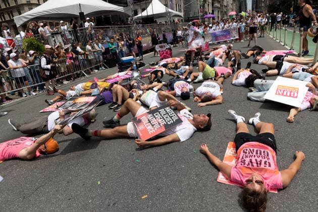 June 28, 2026, New York, New York, USA: As the 57th annual NYC Pride March proceeds down Fifth Avenue from Midtown to Greenwich Village Grand Marshal Gays Against Guns stage a die-in. The direct action group was founded in response to the loss of 49 lives at Pulse Nightclub on June 12, 2016. The theme of Pride For All of Us honors the legacy of activist Marsha P. Johnson. New York USA  - ZUMAr174 20260628_znp_r174_024 Copyright: xGinaxMxRandazzox