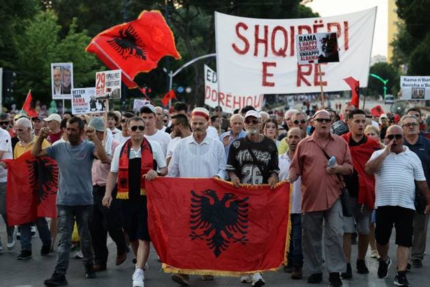 Day 29 Protest in Albania TIRANA, ALBANIA JUNE 28, 2026: Demonstrators gathered in central Tirana during the twenty-ninth consecutive day of protests against a proposed luxury tourism development project linked to Jared Kushner. Participants marched to the Prime Minister™s Office carrying banners, placards and Albanian flags while repeating calls for the cancellation of the project and political accountability. The demonstrations have continued on a daily basis since the end of May. Tirana Albania Copyright: x xVlasovxSulajx xJNAxPressx