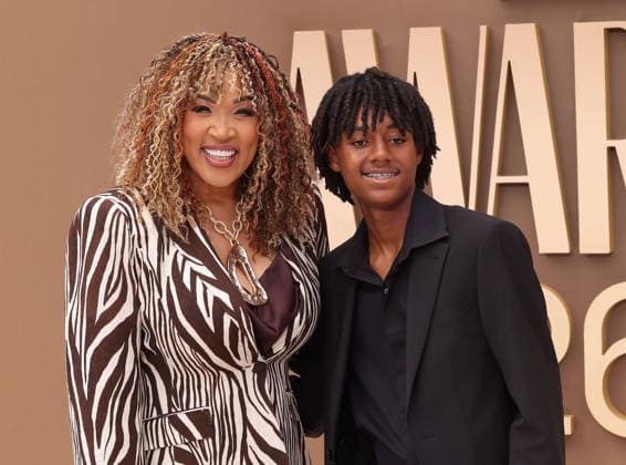 (L-R) Kym Whitley and Joshua Whitley arrive on the red carpet for 26th annual BET Awards live telecast at the Peacock Theater in Los Angeles on Sunday, June 28, 2026. The BET Awards honors Black entertainers and other people of color in music, film, sports and philanthropy.  LAP20260628190 GREGxGRUDT
