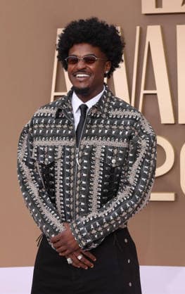 Kenny Iko arrives on the red carpet for 26th annual BET Awards live telecast at the Peacock Theater in Los Angeles on Sunday, June 28, 2026. The BET Awards honors Black entertainers and other people of color in music, film, sports and philanthropy.  LAP20260628247 GREGxGRUDT