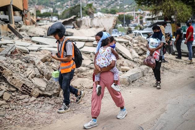 Daily life continues in La Guaira amid search and rescue efforts after Earthquakes LA GUAIRA, VENEZUELA - JUNE 28: A general view of daily life as search and rescue operations continue for survivors trapped under collapsed buildings following two powerful earthquakes, in the coastal state of La Guaira, Venezuela on June 28, 2026 Cem Tekkesinoglu Anadolu La Guaira Venezuela. Editorial use only. Please get in touch for any other usage.  Copyright: x2026xAnadoluxCemxTekkesinoglux