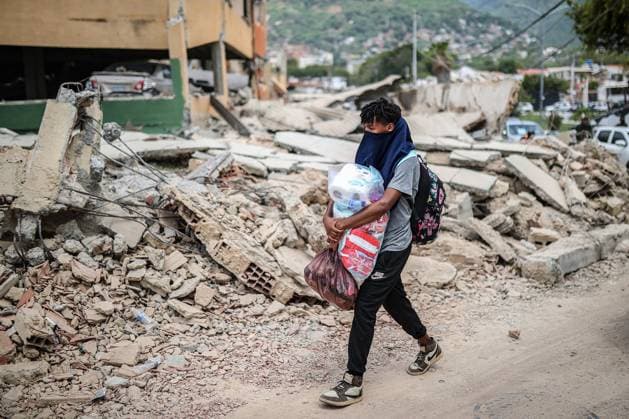 Daily life continues in La Guaira amid search and rescue efforts after Earthquakes LA GUAIRA, VENEZUELA - JUNE 28: A general view of daily life as search and rescue operations continue for survivors trapped under collapsed buildings following two powerful earthquakes, in the coastal state of La Guaira, Venezuela on June 28, 2026 Cem Tekkesinoglu Anadolu La Guaira Venezuela. Editorial use only. Please get in touch for any other usage.  Copyright: x2026xAnadoluxCemxTekkesinoglux
