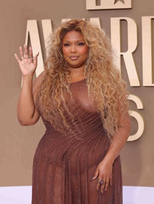 Lizzo arrives on the red carpet for 26th annual BET Awards live telecast at the Peacock Theater in Los Angeles on Sunday, June 28, 2026. The BET Awards honors Black entertainers and other people of color in music, film, sports and philanthropy.  LAP20260628286 GREGxGRUDT