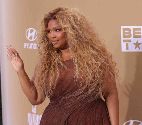 Lizzo arrives on the red carpet for 26th annual BET Awards live telecast at the Peacock Theater in Los Angeles on Sunday, June 28, 2026. The BET Awards honors Black entertainers and other people of color in music, film, sports and philanthropy.  LAP20260628291 GREGxGRUDT