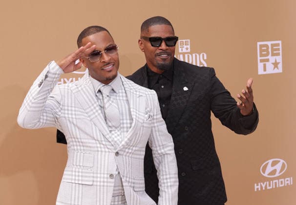 (L-R) T.I. and Jamie Foxx arrive on the red carpet for 26th annual BET Awards live telecast at the Peacock Theater in Los Angeles on Sunday, June 28, 2026. The BET Awards honors Black entertainers and other people of color in music, film, sports and philanthropy.  LAP20260628307 GREGxGRUDT