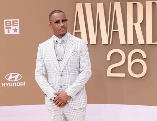 T.I. arrives on the red carpet for 26th annual BET Awards live telecast at the Peacock Theater in Los Angeles on Sunday, June 28, 2026. The BET Awards honors Black entertainers and other people of color in music, film, sports and philanthropy.  LAP20260628309 GREGxGRUDT