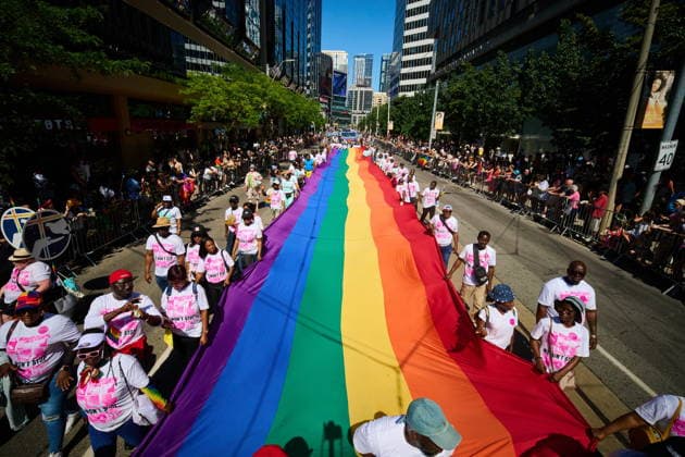 June 28, 2026, Toronto, On, Canada: People carry a rainbow flag as they take part in the Toronto Pride Parade on Sunday, June 28, 2026. Toronto Canada  - ZUMAc35_ 20260628_zaf_c35_136 Copyright: xSammyxKoganx