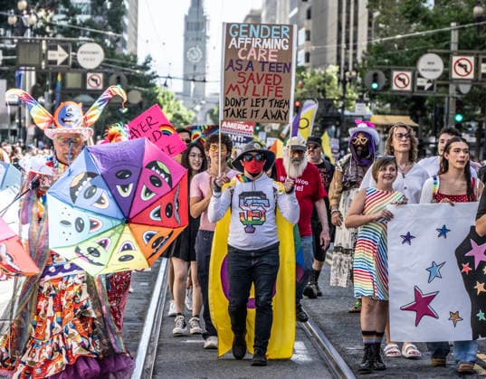 Contingents march up Market Street in the annual LGBTQ Pride Parade in San Francisco on Sunday, Junne 28, 2026. Tens of thousands turned out to watch and participate in the spectacle.  SXP20260628015 TERRYxSCHMITT