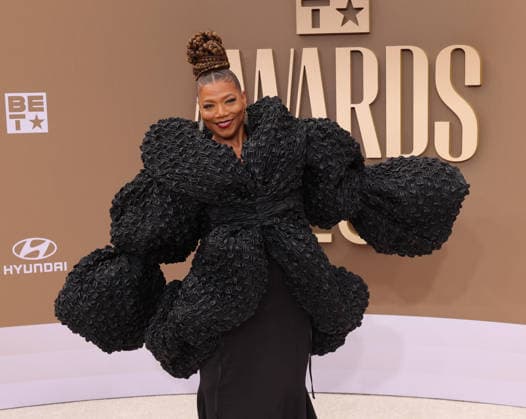 Queen Latifah arrives on the red carpet for 26th annual BET Awards live telecast at the Peacock Theater in Los Angeles on Sunday, June 28, 2026. The BET Awards honors Black entertainers and other people of color in music, film, sports and philanthropy.  LAP20260628366 GREGxGRUDT