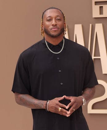 Lecrae Moore arrives on the red carpet for 26th annual BET Awards live telecast at the Peacock Theater in Los Angeles on Sunday, June 28, 2026. The BET Awards honors Black entertainers and other people of color in music, film, sports and philanthropy.  LAP20260628399 GREGxGRUDT