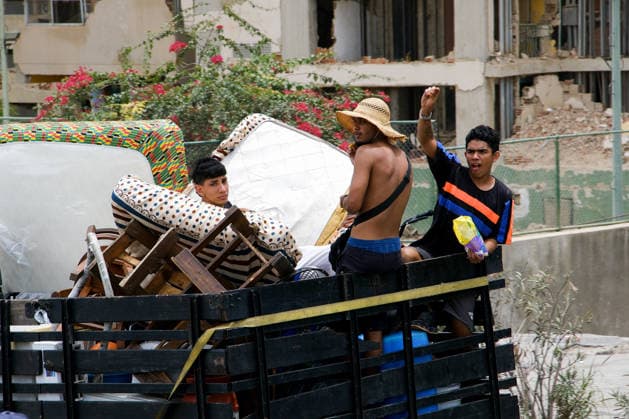 Survivors salvage belongings from rubble following earthquakes in Vargas,Venezuela VARGAS, VENEZUELA - JUNE 28: People who lost their family members and homes try to salvage their remaining belongings from the rubble of collapsed buildings following two powerful earthquakes in the coastal state of Vargas, Venezuela on June 28, 2026. Diko Betancourt Anadolu Vargas Venezuela. Editorial use only. Please get in touch for any other usage.  Copyright: x2026xAnadoluxDikoxBetancourtx