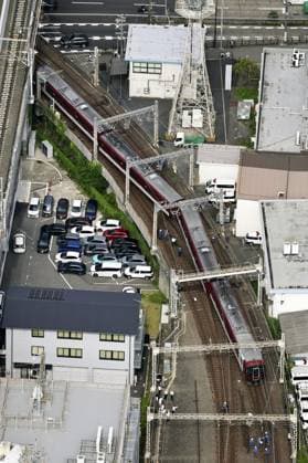 Derailed train in Kyoto Photo taken from a Kyodo News helicopter shows a Kintetsu Kyoto Line train that derailed shortly after leaving Kyoto Station in Kyoto for Kashiharajingu-mae on June 29, 2026. None of the roughly 30 passengers aboard was injured, the train operator said.  A14AA0005620592P