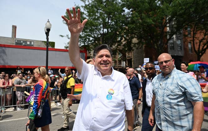 June 28, 2026, Chicago, Illinois, USA: Illinois Governor, JB PRITZKER waves at the crowd as he walks the parade route during Chicago s annual pride parade on Sunday June 28th, 2026. Chicago USA - ZUMAd171 20260628_znp_d171_006 Copyright: xSethxDonovanx