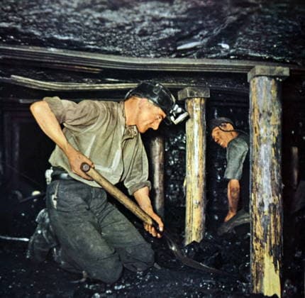 RECORD DATE NOT STATED Photograph of miners in a coal mine Photograph of miners in a coal mine, Midlands, England Editorial use only. All other uses to be cleared with the copyright owner (World History Archive), in advance., WHA_128_0180.jpg, Miners; coal mine; Midlands; England; industrial; workers; underground; labor; hard hats; helmets; mining; coal; shaft; underground; digging; laborers; British; industry; workers; men; coal dust; machinery; equipment; hard work; laboring; miners; British; historical; black and white; industrial revolution; working class. Copyright: xWorldxHistoryxArchivex