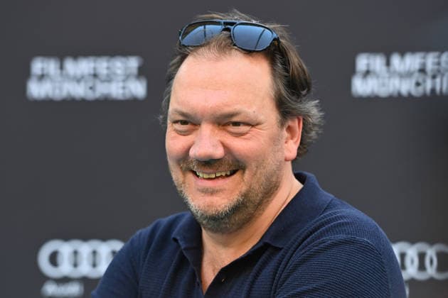 Charly HUEBNER (Schauspieler), Einzelbild,angeschnittenes Einzelmotiv,Portraet,Portrait,Porträt. 43.Filmfest Muenchen Premiere SPAZIERGANG NACH SYRAKUS am 28.06.2026 Deutsches Theater. *** Charly HUEBNER, actor; still image; cropped single shot; portrait; 43rd Munich Film Festival premiere of *A Walk to Syracuse* on June 28, 2026, at the Deutsches Theater