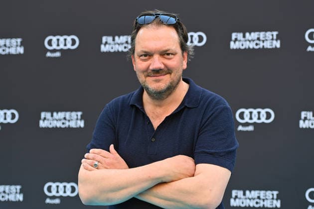Charly HUEBNER (Schauspieler), Einzelbild,angeschnittenes Einzelmotiv,Halbfigur,halbe Figur, 43.Filmfest Muenchen Premiere SPAZIERGANG NACH SYRAKUS am 28.06.2026 Deutsches Theater. *** Charly HUEBNER, actor; still image, cropped single shot, half-length portrait, 43rd Munich Film Festival premiere of *A Walk to Syracuse* on June 28, 2026, at the Deutsches Theater