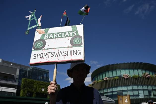 Pro-Palestinian protest held outside Wimbledon on opening day in London LONDON, UNITED KINGDOM - JUNE 29: Pro-Palestinian demonstrators gather outside the All England Lawn Tennis and Croquet Club on the opening day of the Wimbledon Championships in London, United Kingdom, on June 29, 2026. Demonstrators protested against financing by the bank of companies producing weapons and military technology sold to Israel and expressed support for Palestine. Rasid Necati Aslim Anadolu London United Kingdom. Editorial use only. Please get in touch for any other usage.  Copyright: x2026xAnadoluxRasidxNecatixAslimx