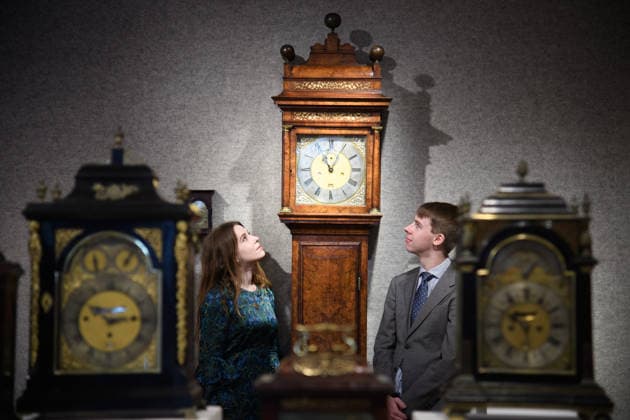 Bonhams Classics Week Sales at Bonhams, London, UK - 29 June 2026 A staff member views An exceptional early 18th century burr walnut month-going longcase clock - Thomas Tompion, London, No. 385 (est. Â£150k - Â£250k) which is part of Bonhams Classics Week Sales on 30th June - 2nd July at Bonhams, London, England, UK on Monday 29 June, 2026., Credit:Justin Ng Avalon UK, England, London, Bonhams  Copyright: xJustinxNgx xAvalonx 1113334515