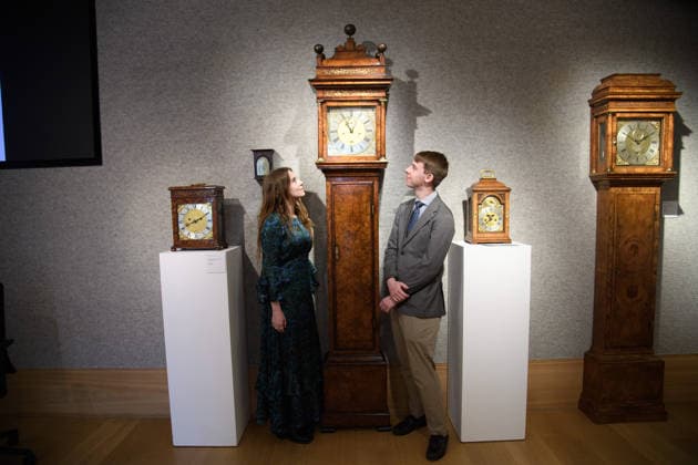 Bonhams Classics Week Sales at Bonhams, London, UK - 29 June 2026 A staff member views An exceptional early 18th century burr walnut month-going longcase clock - Thomas Tompion, London, No. 385 (est. Â£150k - Â£250k) which is part of Bonhams Classics Week Sales on 30th June - 2nd July at Bonhams, London, England, UK on Monday 29 June, 2026., Credit:Justin Ng Avalon UK, England, London, Bonhams  Copyright: xJustinxNgx xAvalonx 1113334520
