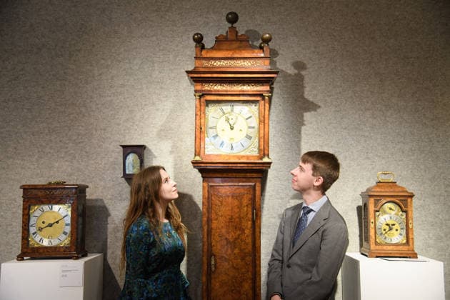 Bonhams Classics Week Sales at Bonhams, London, UK - 29 June 2026 A staff member views An exceptional early 18th century burr walnut month-going longcase clock - Thomas Tompion, London, No. 385 (est. Â£150k - Â£250k) which is part of Bonhams Classics Week Sales on 30th June - 2nd July at Bonhams, London, England, UK on Monday 29 June, 2026., Credit:Justin Ng Avalon UK, England, London, Bonhams  Copyright: xJustinxNgx xAvalonx 1113334523