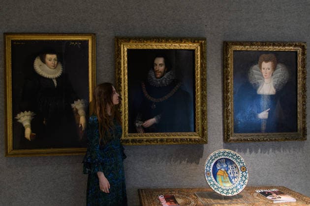 Bonhams Classics Week Sales at Bonhams, London, UK - 29 June 2026 A staff member views (L) - Portrait of a lady in a black silk dress, her ruff and cuffs edged in lace Attributed to Marcus Gheeraerts the Younger (est. Â£15k - Â£20k), (M) - Portrait of Catherine Howard, Countess of Nottingham, in a black dress decorated with white lace in a carved frame by Robert Peake the Elder (est. Â£150k - Â£200k) and (R) - Portrait of Thomas Howard, 14th Earl of Arundel, half length, in a black costume and white lace ruff, with the collar of the Garter and holding gloves in his left hand in a carved frame by Marcus Gheeraerts the Younger (est. Â£150k - Â£200k) which is part of Bonhams Classics Week Sales on 30th June - 2nd July at Bonhams, Lond  Copyright: xJustinxNgx xAvalonx 1113334552