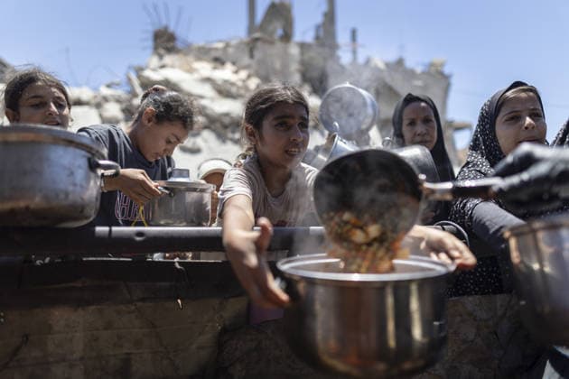 Food distributed to Palestinians in Gaza s Jabalia JABALIA, GAZA, PALESTINE - JUNE 29: Palestinians, including children, wait in line to receive food distributed by a charity organization as food shortage continues due to Israel s blockade and restriction of aid entries into the Gaza Strip, at Jabalia Refugee Camp in northern Gaza, Palestine on June 29, 2026. Mahmoud Abu Hamda Anadolu Jabalia Gaza. Editorial use only. Please get in touch for any other usage.  Copyright: x2026xAnadoluxMahmoudxAbuxHamdax