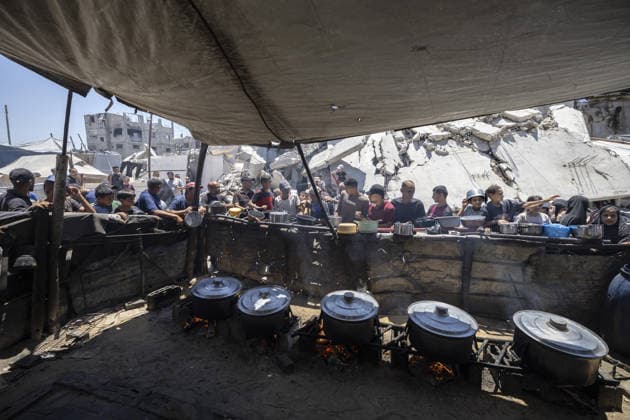 Food distributed to Palestinians in Gaza s Jabalia JABALIA, GAZA, PALESTINE - JUNE 29: Palestinians, including children, wait in line to receive food distributed by a charity organization as food shortage continues due to Israel s blockade and restriction of aid entries into the Gaza Strip, at Jabalia Refugee Camp in northern Gaza, Palestine on June 29, 2026. Mahmoud Abu Hamda Anadolu Jabalia Gaza. Editorial use only. Please get in touch for any other usage.  Copyright: x2026xAnadoluxMahmoudxAbuxHamdax