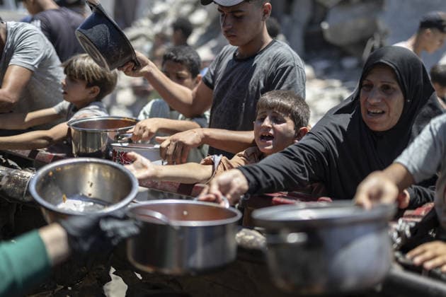 Food distributed to Palestinians in Gaza s Jabalia JABALIA, GAZA, PALESTINE - JUNE 29: Palestinians, including children, wait in line to receive food distributed by a charity organization as food shortage continues due to Israel s blockade and restriction of aid entries into the Gaza Strip, at Jabalia Refugee Camp in northern Gaza, Palestine on June 29, 2026. Mahmoud Abu Hamda Anadolu Jabalia Gaza. Editorial use only. Please get in touch for any other usage.  Copyright: x2026xAnadoluxMahmoudxAbuxHamdax