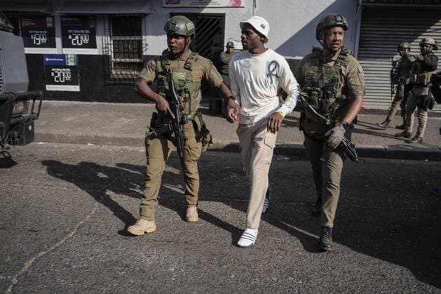 Anti-immigrant demonstrations continue in South Africa SOWETO, SOUTH AFRICA - JUNE 29: Special forces check the ID s of some protesters as hundreds of people gather to protest irregular migrants and called on the government to deport undocumented immigrants in Soweto, in South Africa s Johannesburg province, on June 29, 2026. Anti-immigrant demonstrations are being held across South Africa as growing pressure on foreign nationals in recent months has brought migration, unemployment and security issues back into the national spotlight. Ihsaan Haffejee Anadolu Soweto South Africa. Editorial use only. Please get in touch for any other usage.  Copyright: x2026xAnadoluxIhsaanxHaffejeex