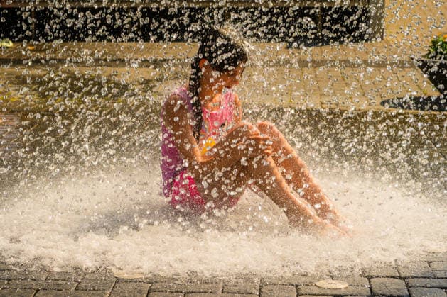Hot weather hits Vilnius VILNIUS, LITHUANIA - JUNE 29: A child cools off in a fountain as temperatures climb close to 33 degrees Celsius during a heatwave in Vilnius, Lithuania, on June 29, 2026. Residents sought relief from the hot weather in fountains, parks and other public spaces as the prolonged heatwave continued across the country. Yauhen Yerchak Anadolu Vilnius Lithuania. Editorial use only. Please get in touch for any other usage.  Copyright: x2026xAnadoluxYauhenxYerchakx