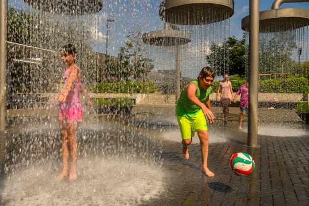 Hot weather hits Vilnius VILNIUS, LITHUANIA - JUNE 29: Children play in a fountain to cool off as temperatures climb close to 33 degrees Celsius during a heatwave in Vilnius, Lithuania, on June 29, 2026. Residents sought relief from the hot weather in fountains, parks and other public spaces as the prolonged heatwave continued across the country. Yauhen Yerchak Anadolu Vilnius Lithuania. Editorial use only. Please get in touch for any other usage.  Copyright: x2026xAnadoluxYauhenxYerchakx