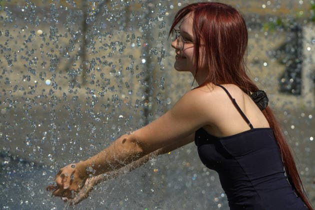 Hot weather hits Vilnius VILNIUS, LITHUANIA - JUNE 29: A woman cools off in a fountain as temperatures climb close to 33 degrees Celsius during a heatwave in Vilnius, Lithuania, on June 29, 2026. Residents sought relief from the hot weather in fountains, parks and other public spaces as the prolonged heatwave continued across the country. Yauhen Yerchak Anadolu Vilnius Lithuania. Editorial use only. Please get in touch for any other usage.  Copyright: x2026xAnadoluxYauhenxYerchakx