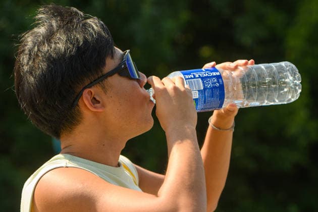 Hot weather hits Vilnius VILNIUS, LITHUANIA - JUNE 29: A man drinks water as temperatures climb close to 33 degrees Celsius during a heatwave in Vilnius, Lithuania, on June 29, 2026. Residents sought relief from the hot weather in fountains, parks and other public spaces as the prolonged heatwave continued across the country. Yauhen Yerchak Anadolu Vilnius Lithuania. Editorial use only. Please get in touch for any other usage.  Copyright: x2026xAnadoluxYauhenxYerchakx