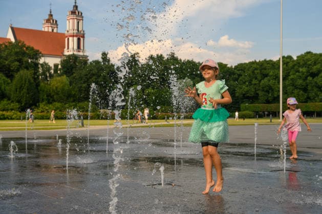 Hot weather hits Vilnius VILNIUS, LITHUANIA - JUNE 29: A child plays in a fountain as temperatures climb close to 33 degrees Celsius during a heatwave in Vilnius, Lithuania, on June 29, 2026. Residents sought relief from the hot weather in fountains, parks and other public spaces as the prolonged heatwave continued across the country. Yauhen Yerchak Anadolu Vilnius Lithuania. Editorial use only. Please get in touch for any other usage.  Copyright: x2026xAnadoluxYauhenxYerchakx