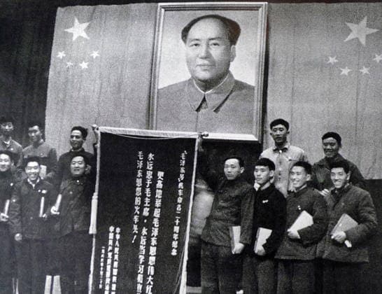RECORD DATE NOT STATED Red Guards with a portrait of Mao Zedong, during the Cultural Revolution Red Guards with a portrait of Mao Zedong, during the Cultural Revolution. China 1967 Editorial use only. All other uses to be cleared with the copyright owner (World History Archive), in advance., WHA_133_0847.jpg, Red Guards; Mao Zedong; Cultural Revolution; China; 1967; portrait; revolutionaries; political movement; propaganda; historical; Chinese history; youth movement; political ideology; communism; socialist; rebellion; political leader; iconic; vintage; black and white; historical photograph; Chinese culture; political activism; authoritarian regime; Chairman Mao; political poster; socialist realism; political symbol; historical figure; po Copyright: xWorldxHistoryxArchivex