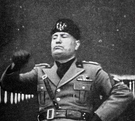 RECORD DATE NOT STATED Mussolini Black and white photograph of Italian Prime Minister Benito Mussolini (1883-1945) on the balcony of the Palace of Venice announcing Italy entering the war on 10 June 1940. Editorial use only. All other uses to be cleared with the copyright owner (World History Archive), in advance., WHA_134_0473.jpg, Benito Mussolini; Italian Prime Minister; 1940; World War II; Italy; Palace of Venice; balcony; announcement; war declaration; black and white; historical; dictator; fascism; European history; political leader; dictator; propaganda; public speech; nationalism; Italian history; 20th century; leader; dictator; military; fascism; dictator; balcony speech; Italian leader; historical figure; WWII announcement. Copyright: xWorldxHistoryxArchivex