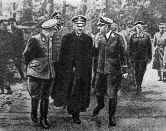 RECORD DATE NOT STATED Hitler Survives Assassination Attempt Black and white photograph of World War II (1939-1945) showing Adolf Hitler (1889-1945) flanked by his officers exiting his general quarters after the attempt to assassinate him in July of 1944. Editorial use only. All other uses to be cleared with the copyright owner (World History Archive), in advance., WHA_134_0634.jpg, World War II; Adolf Hitler; 1939-1945; assassination attempt; July 1944; officers; general quarters; black and white photograph; historical; Nazi Germany; dictator; military; World War Two; Third Reich; German history; assassination plot; failed attempt; Hitler s entourage; historical figure; war leader; Nazi leader; military uniform; historical event; historica Copyright: xWorldxHistoryxArchivex