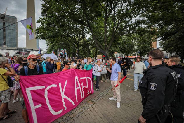 June 29, 2026, Berlin, Berlin, Germany: BERLIN, GERMANY Ã¢â‚¬ JUNE 29, 2026: Counter-demonstrators gather at Alexanderplatz during a protest against the far-right Alternative for Germany (AfD) party, while AfD supporters hold a nearby rally under a heavy police presence. Demonstrators carried banners calling for a ban on the AfD, anti-fascist slogans, LGBTQ+ pride flags and anti-racism messages as officers separated the opposing groups in central Berlin. ZUMA Press Wire Berlin Germany - ZUMAa268 20260629_zip_a268_005 Copyright: xAbdelrahmanxAlkahloutx
