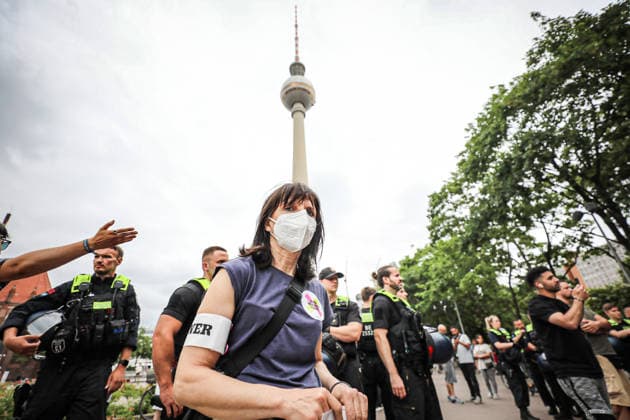 June 29, 2026, Berlin, Berlin, Germany: BERLIN, GERMANY Ã¢â‚¬ JUNE 29, 2026: Counter-demonstrators gather at Alexanderplatz during a protest against the far-right Alternative for Germany (AfD) party, while AfD supporters hold a nearby rally under a heavy police presence. Demonstrators carried banners calling for a ban on the AfD, anti-fascist slogans, LGBTQ+ pride flags and anti-racism messages as officers separated the opposing groups in central Berlin. ZUMA Press Wire Berlin Germany - ZUMAa268 20260629_zip_a268_007 Copyright: xAbdelrahmanxAlkahloutx