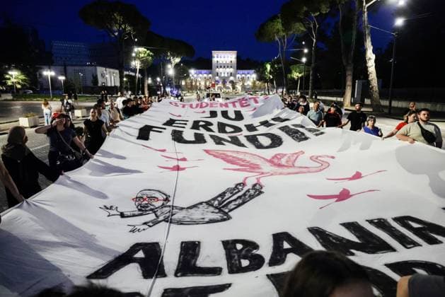 Protests Against Kushner-Linked Development Enter 30th Day in Tirana TIRANA, ALBANIA JUNE 29, 2026: Demonstrators gathered in Tirana during the thirtieth consecutive day of protests against a proposed luxury tourism development project linked to Jared Kushner. Student protesters briefly unfurled a giant banner from the facade of the University of Tirana reading Students: Your Time Is Up alongside the slogan Albania Is Not for Sale before university security removed it. Protesters then marched to the university, where the banner was displayed again following a tense verbal confrontation with security personnel before eventually being taken down and carried through the demonstration. The protest was also attended by several Me Copyright: x xVlasovxSulajx xJNAxPressx