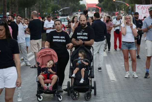 Protests Against Kushner-Linked Development Enter 30th Day in Tirana TIRANA, ALBANIA JUNE 29, 2026: Demonstrators gathered in Tirana during the thirtieth consecutive day of protests against a proposed luxury tourism development project linked to Jared Kushner. Student protesters briefly unfurled a giant banner from the facade of the University of Tirana reading Students: Your Time Is Up alongside the slogan Albania Is Not for Sale before university security removed it. Protesters then marched to the university, where the banner was displayed again following a tense verbal confrontation with security personnel before eventually being taken down and carried through the demonstration. The protest was also attended by several Me Copyright: x xVlasovxSulajx xJNAxPressx