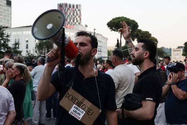 Protests Against Kushner-Linked Development Enter 30th Day in Tirana TIRANA, ALBANIA JUNE 29, 2026: Demonstrators gathered in Tirana during the thirtieth consecutive day of protests against a proposed luxury tourism development project linked to Jared Kushner. Student protesters briefly unfurled a giant banner from the facade of the University of Tirana reading Students: Your Time Is Up alongside the slogan Albania Is Not for Sale before university security removed it. Protesters then marched to the university, where the banner was displayed again following a tense verbal confrontation with security personnel before eventually being taken down and carried through the demonstration. The protest was also attended by several Me Copyright: x xVlasovxSulajx xJNAxPressx