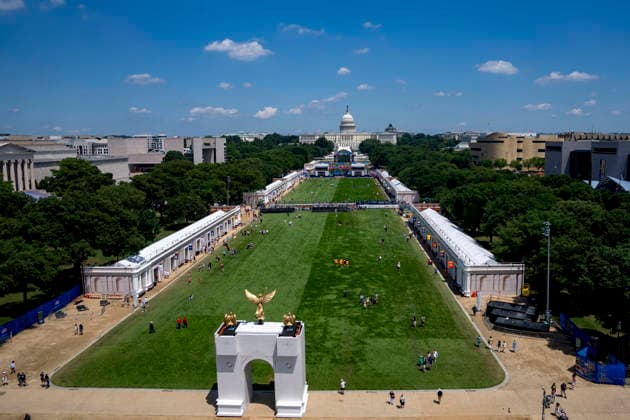 The U.S. Capitol is seen along with a model of President Donald Trump s Triumphal Arch as visitors attend the fifth day of the Great American State Fair on the National Mall on Monday, June 29, 2026. The Freedom 250-backed Great American State Fair celebrating the 250th anniversary of the United States runs through July 10th.  WAP20260629396 BONNIExCASH