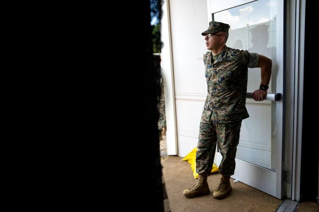 A member of the U.S. Marines stands by the entrance of the Department of War exhibit during the fifth day of the Great American State Fair on the National Mall on Monday, June 29, 2026. The Freedom 250-backed Great American State Fair celebrating the 250th anniversary of the United States runs through July 10th.  WAP20260629407 BONNIExCASH