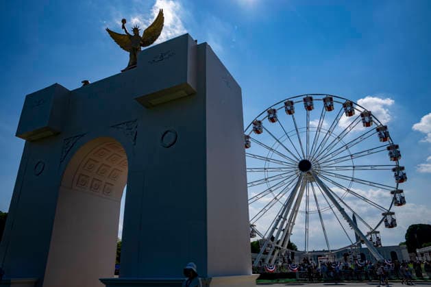 A model of President Donald Trump s Triumphal Arch and a ferris wheel are seen during the fifth day of the Great American State Fair on the National Mall on Monday, June 29, 2026. The Freedom 250-backed Great American State Fair celebrating the 250th anniversary of the United States runs through July 10th.  WAP20260629418 BONNIExCASH