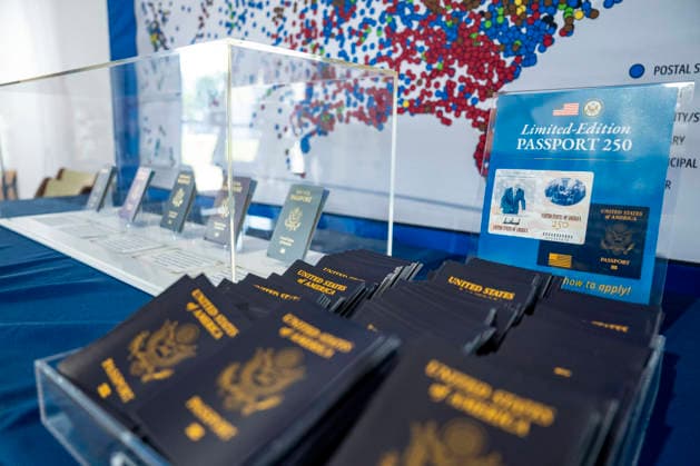 Information booklets on the Passport 250 , a limited edition U.S. Passport featuring U.S. President Donald Trump, are seen amongst the different types of American passports in the State Department exhibit on the fifth day of the Great American State Fair on the National Mall on Monday, June 29, 2026. The Freedom 250-backed Great American State Fair celebrating the 250th anniversary of the United States runs through July 10th.  WAP20260629426 BONNIExCASH
