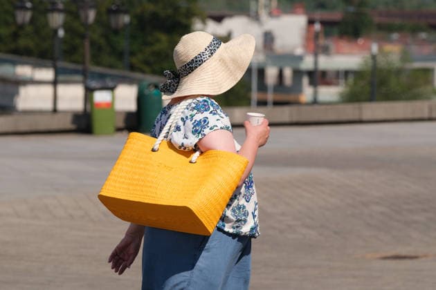 June 29, 2026, Warsaw, Masovian Voivodeship, Poland: A woman in a wide-brimmed hats crosses Castle Square as she drinks water from a cup during severe heat in Warsaw, Poland. This was the second day in a row that temperatures in the Polish capital climbed over 35Ã‚Â°C, as a scorching heat dome moves eastwards across Europe, bringing with it record-breaking high temperatures. Warsaw Poland - ZUMAk204 20260629_zip_k204_032 Copyright: xRomanxKozielx