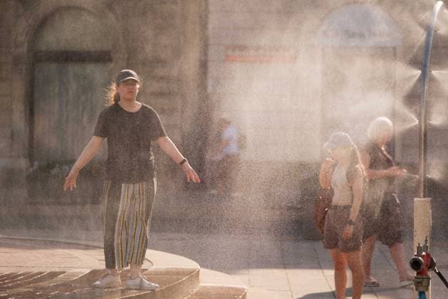 June 29, 2026, Warsaw, Masovian Voivodeship, Poland: A girl cools off under a mist sprinkler during severe heat in Warsaw, Poland. This was the second day in a row that temperatures in the Polish capital climbed over 35Ã‚Â°C, as a scorching heat dome moves eastwards across Europe, bringing with it record-breaking high temperatures. Warsaw Poland - ZUMAk204 20260629_zip_k204_045 Copyright: xRomanxKozielx